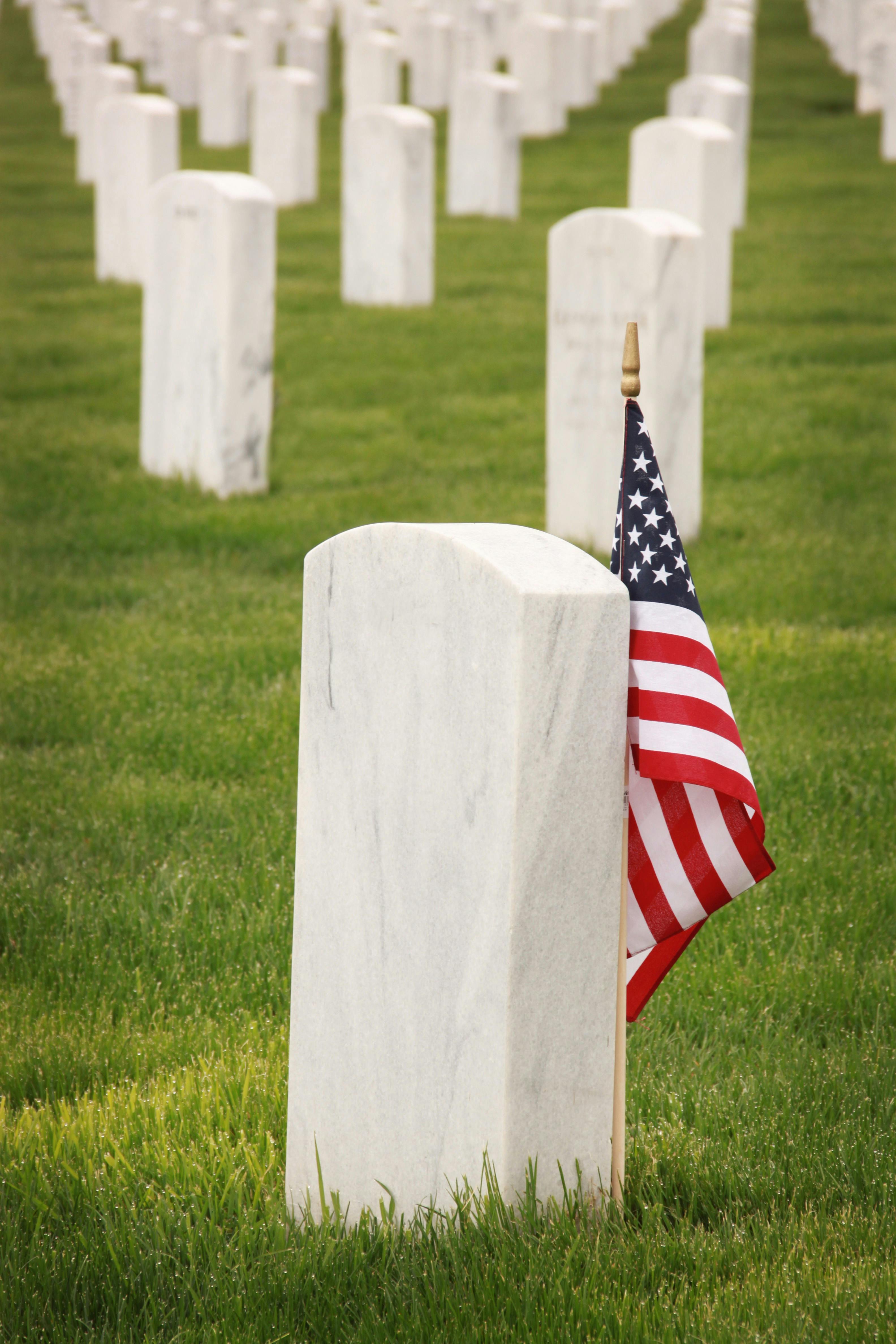 grave stone and flag