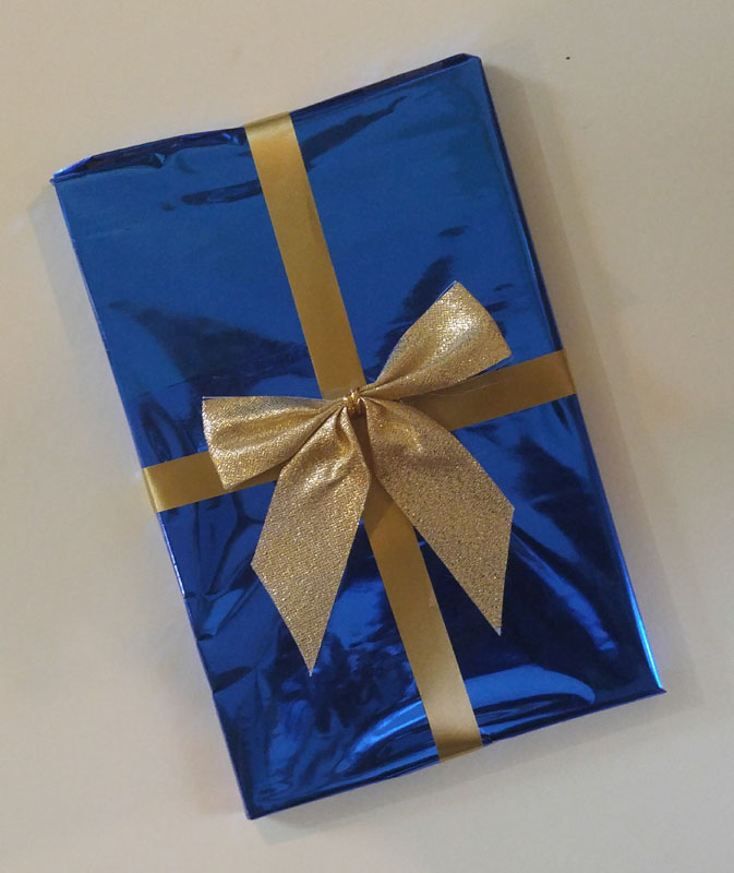 A book wrapped in wrapping paper