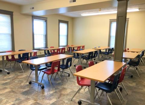 Meeting room with tables and chairs