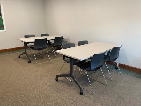 meeting room with tables and chairs