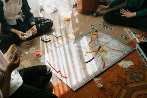 People playing a board game.