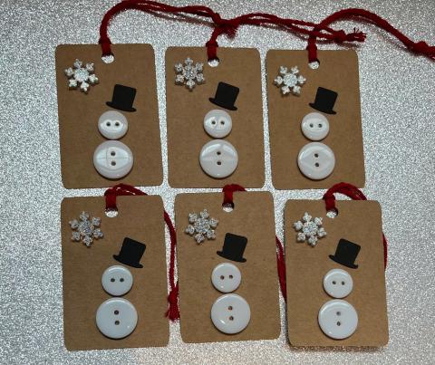 Button snow men on gift tags.