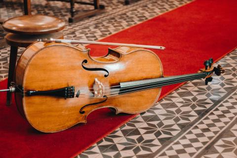 cello laying on the floor