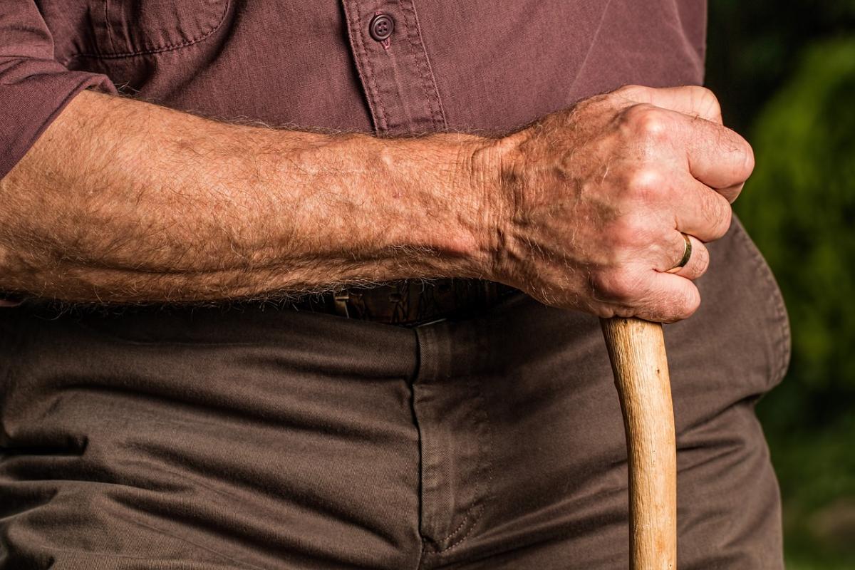 man holding cane